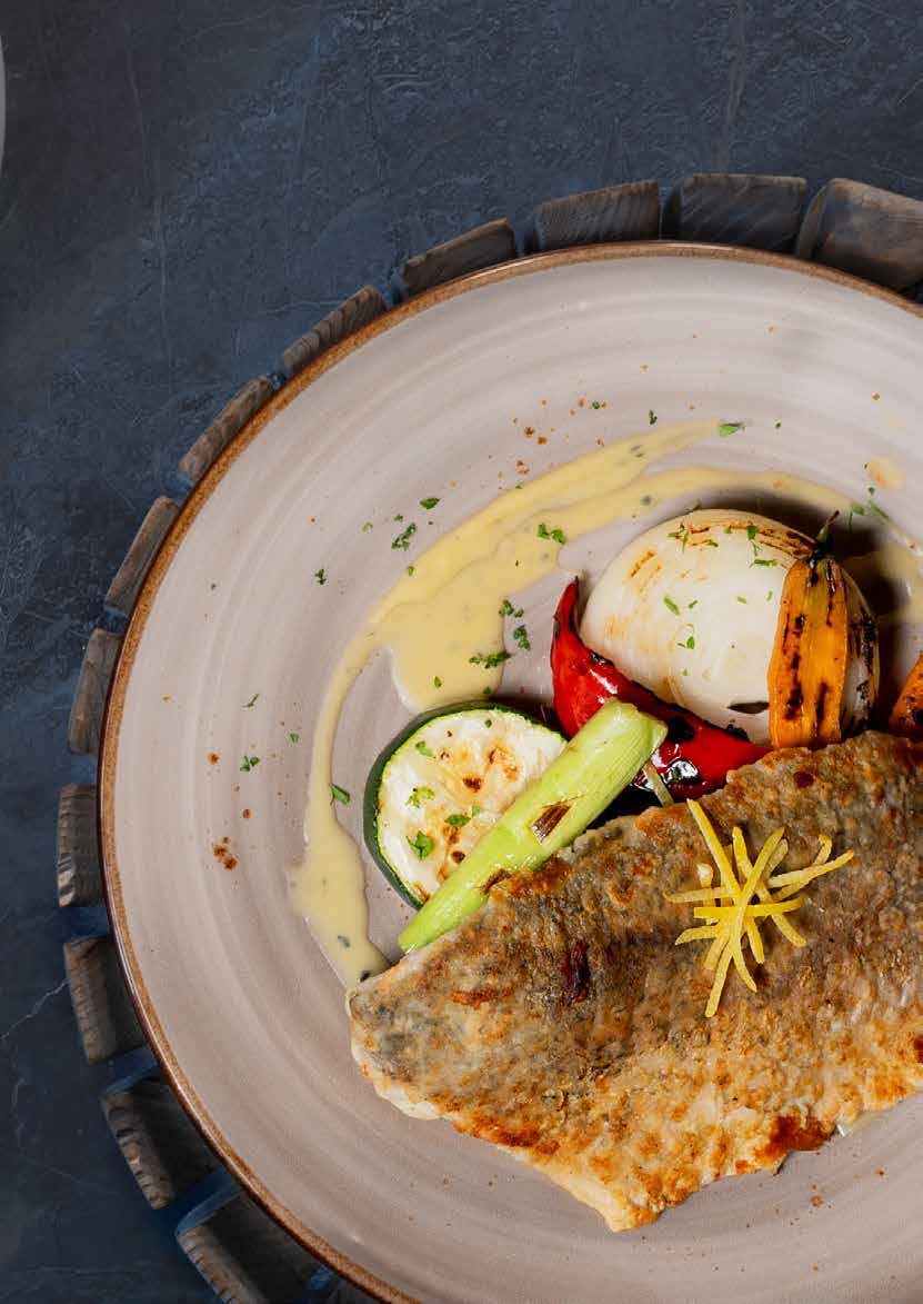 Earle’s grilled seabass with lemon butter and vegetables